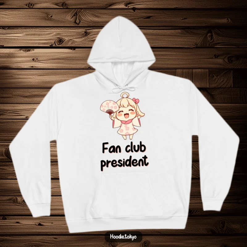 Funny Blooming Fan Hoodie: A joyful character enthusiastically waving a fan with blooming patterns, perfect for cozying up with cheer.