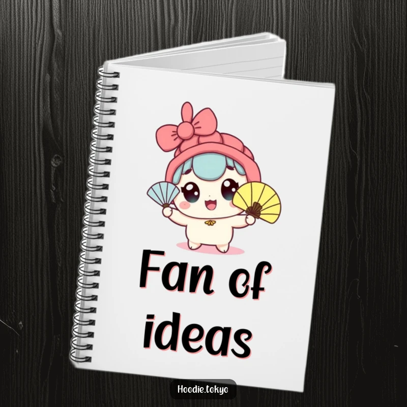 Funny kawaii character notebook with wide eyes enthusiastically waving a fan, great for jotting down cool thoughts.