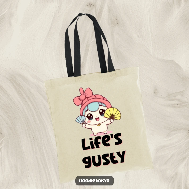 Funny kawaii character tote bag featuring wide eyes and enthusiastic fan waving, ideal for carrying essentials in style.